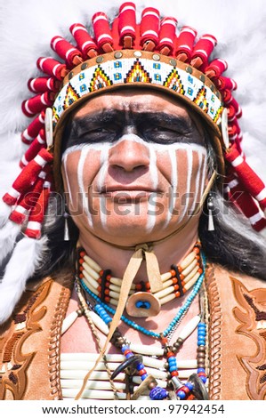 Portrait of american indian chief in national dress