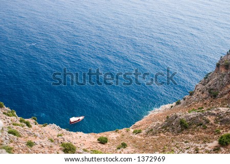 view from the cliff, blue ocean with boat