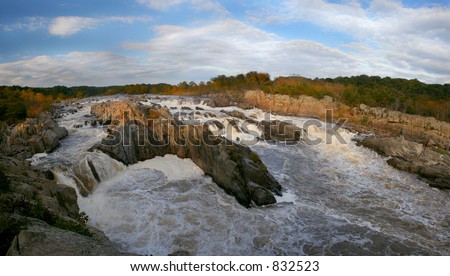 Great Falls, Virginia, panorama at sunset. Shot from the Virginia side, Maryland on the other side. People on left shore give idea of scale.