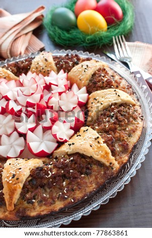 Minced meat appetizer with dough in shape of a flower
