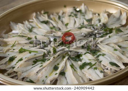 traditional dish of the mediterranean diet:marinated anchovies