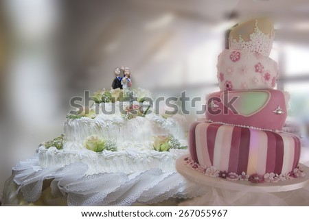 typical wedding cake with decorations and lace