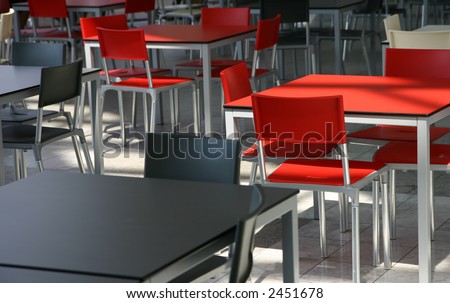 Modern tables and chairs in a cafeteria