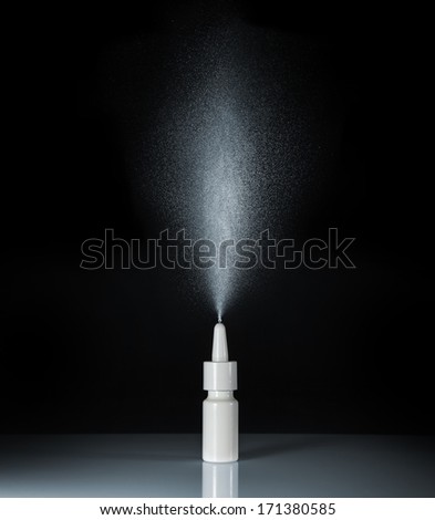 spraying nasal spray