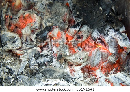 Decaying coals lay and turn to ashes