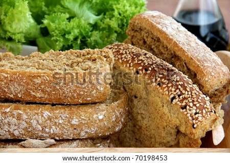 Still life  with rusk ,bread,Butter Lettuce on wooden background