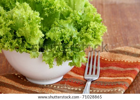 salad with Butter Lettuce on wooden background
