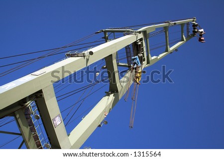The arm of a big harbor crane (Antwerp port, Belgium)