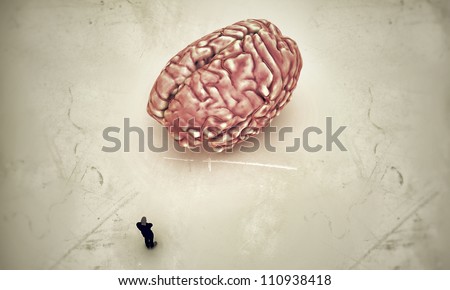 man in black thinking with a big brain