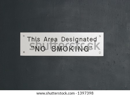 This area designated no smoking.  Sign black text on white.
