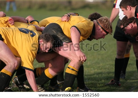 New Zealand club Rugby Action.  Kirwee vs Darfield, the Kirwee front row packs down for a scrum.