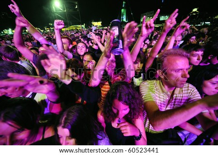 BELGRADE - AUGUST 18: Young people are enjoying concert of Serbian band \