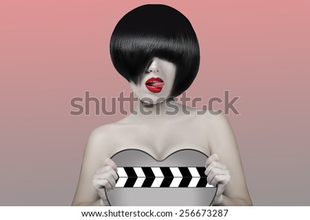 dark-haired woman with short hair loves cinema