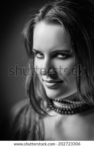 sensual girl with fluffy hair monochrome image