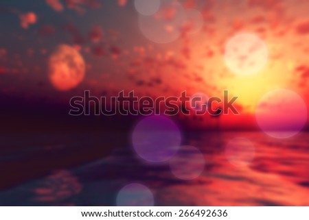 sun and moon over island with coconut palms blurred background