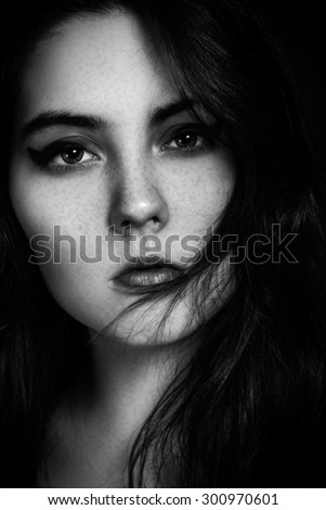 sensual woman with freckles portrait monochrome