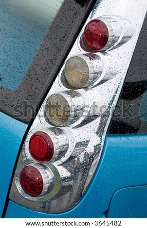 Indicator light cluster of car in the rain