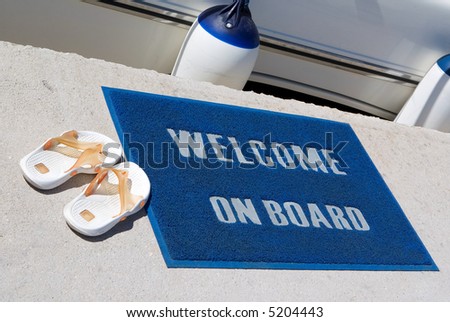 Welcome on board mat and flip flops
