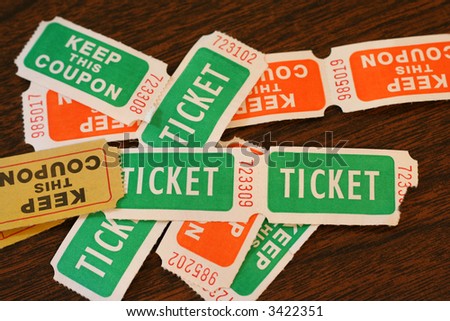 Several colored admission tickets