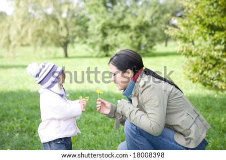 happy family playing in park