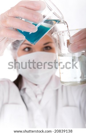 attractive brunette female doctor in laboratory