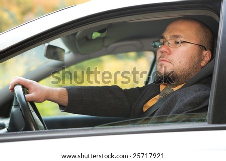 stock-photo-happy-man-traveling-by-car-25717921.jpg