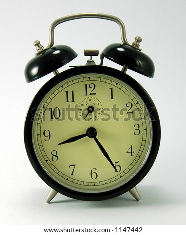 an old mechanical alarm clock