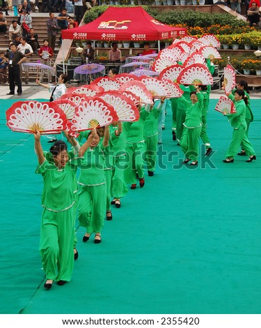 chinese traditional fan dance performed by elderly ladies in China