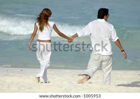 Holding Hands Walking. the beach holding hands