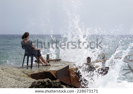 Women relaxing in the sun and listening to the music of the ocean.
