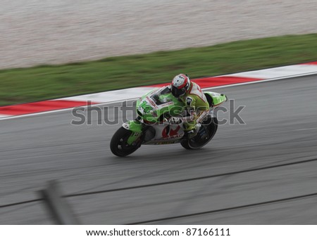 SEPANG,MALAYSIA-OCT.21:RANDY DE PUNIET of PRAMAC RACING TEAM in action during practice session of Shell Advance Malaysian Moto GrandPrix on Oct. 21 2011 in Sepang, Malaysia.