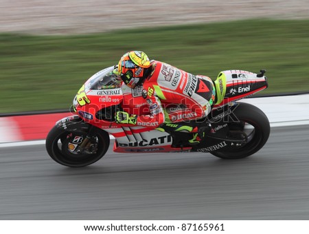 SEPANG,MALAYSIA-OCT.21:Valentino Rossi of Ducati Team in action during practice session of Shell Advance Malaysian Moto GrandPrix on Oct. 21 2011 in Sepang, Malaysia.