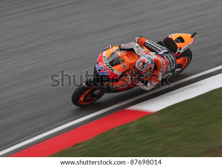 SEPANG,MALAYSIA-OCT.21:Casey Stoner of Repsol Honda in action during practice session of Shell Advance Malaysian Moto GrandPrix on Oct. 21 2011 in Sepang, Malaysia.