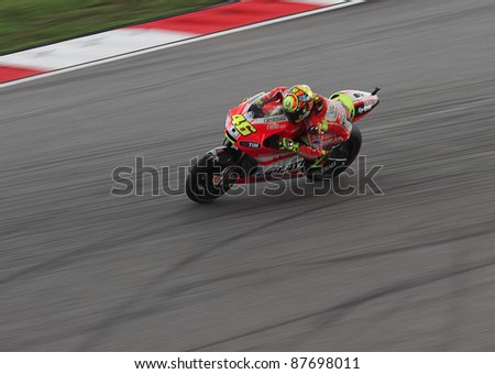 SEPANG,MALAYSIA-OCT.21:Valentino Rossi of Ducati Team in action during practice session of Shell Advance Malaysian Moto GrandPrix on Oct. 21 2011 in Sepang, Malaysia.