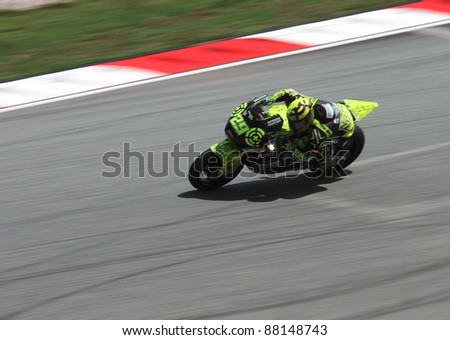 SEPANG,MALAYSIA-OCT.21:Andrea Iannone of Speed Master in action during practice session of Shell Advance Malaysian Moto GrandPrix on Oct. 21 2011 in Sepang, Malaysia.