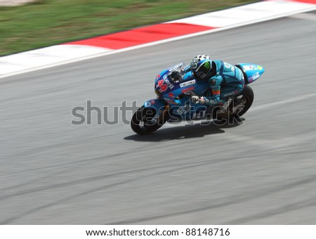 SEPANG,MALAYSIA-OCT.21:Aleix Espargaro of Pons HP 40 in action during practice session of Shell Advance Malaysian Moto GrandPrix on Oct. 21 2011 in Sepang, Malaysia.