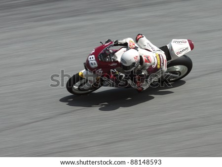 SEPANG,MALAYSIA-OCT.21:Ricard Cardus of QMMF Racing Team in action during practice session of Shell Advance Malaysian Moto GrandPrix on Oct. 21 2011 in Sepang, Malaysia.