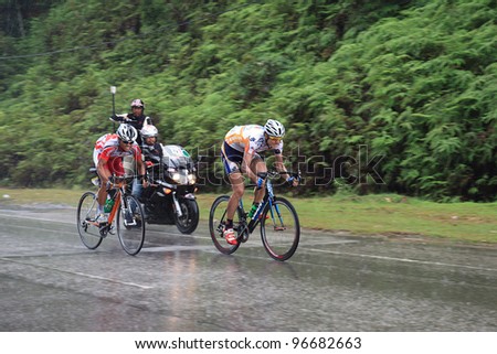 KUANTAN-MARCH 2: Hao Liu (MAX Success Sports) & Wijaya Endra (Indonesia Team) in action during Stage 8 of the le Tour de Langkawi from Bentong to Kuantan on March 2, 2012 in Kuantan, Pahang, Malaysia.