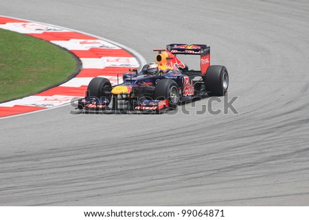 SEPANG, MALAYSIA - MARCH 23: German Sebastian Vettel of Red Bull Racing-Renault in action during Friday practice at Petronas Formula 1 Grand Prix on March 23, 2012 in Sepang, Malaysia