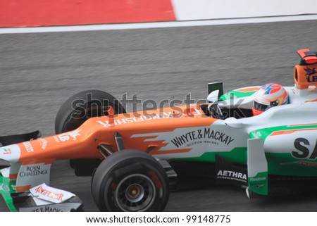 SEPANG, MALAYSIA - MARCH 23: British Paul di Resta of Force India-Mercedes in action during Friday practice at Petronas Formula 1 Grand Prix on March 23, 2012 in Sepang, Malaysia