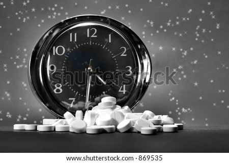 Nighttime Relief: Black and white image of a clock and a pile of pills against a starry background. Conceptual image to represent relief through the night (4:30 a.m. here).