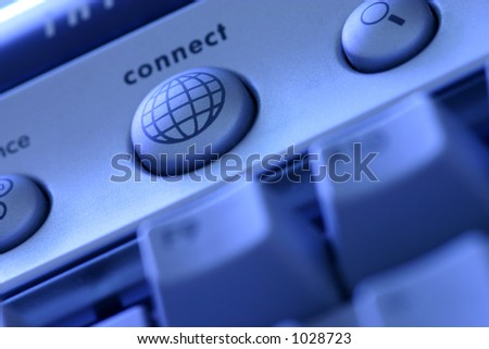 Instant Access: connect button on a computer keyboard leads the way to the world wide web at the push of a button. Selectively focused on connect button.