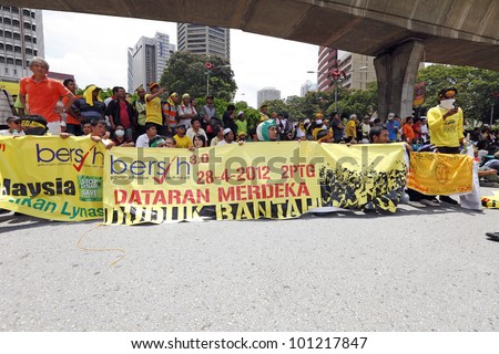 KUALA LUMPUR, MALAYSIA - APRIL 28: Protesters at the protest rally organized by the coalition for clean and fair election in Dataran Merdeka on April 28, 2012 in Jln Parlimen, Kuala Lumpur, Malaysia.