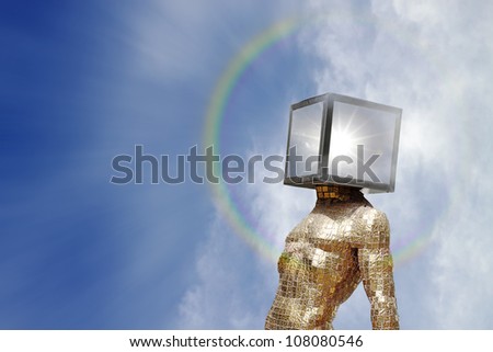 A golden cyclops with a star radiating in its head creating a rainbow halo on a dramatic blue cloudy sky for the concept of Particle of God.
