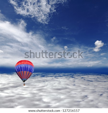 A red hot air balloon floating above the earth stratosphere.