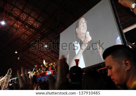 PETALING JAYA, MALAYSIA - MAY 8: Khalid Ibrahim on a projector screen at a political rally against Malaysia 13th general election vote result on May 8, 2013 in Stadium MBPJ, Petaling Jaya, Malaysia.