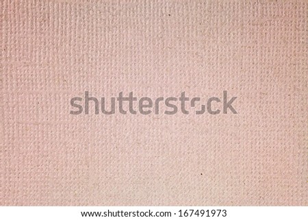 Grungy pink color recycle wood pulp paper for textural background.