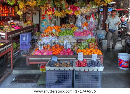 AIR ITAM, PENANG, MALAYSIA - JANUARY 2, 2014: A tradtional fruit stall in the Rifle Range wet market. Penang traditional lifestyle is part of the UNESCO world heritage.