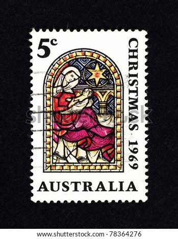 AUSTRALIA - CIRCA 1969: Postage stamp from Australia depicting the virgin Mother Mary holding baby Jesus, circa 1969.