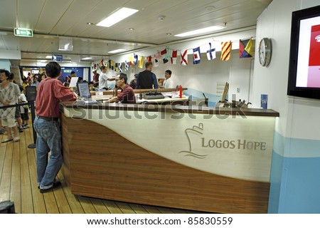 PORT KLANG, MALAYSIA - OCTOBER 1: Visitors at the MV Logos Hope reception on October 1, 2011 in Port Klang, Malaysia.The 132.5m long ship host the world biggest floating book fair with 5000 book title